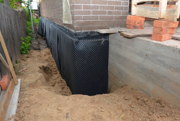 Happy homeowners after waterproofing job in Mickleton